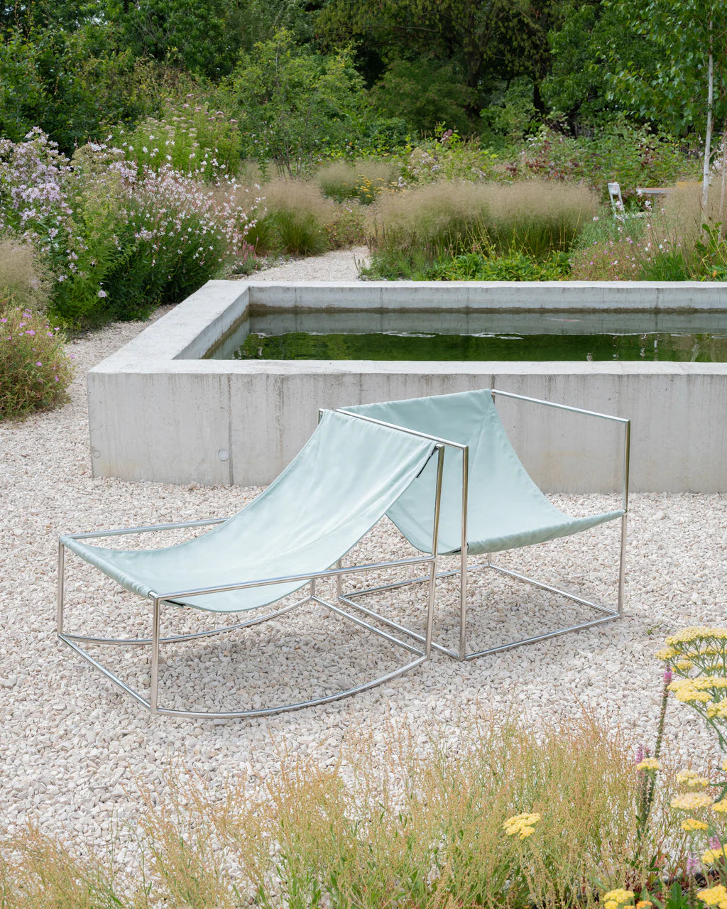 Rocking chair stainless steel - by Muller Van Severen